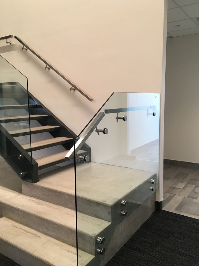 stairs with farmless glass railing - metal design
