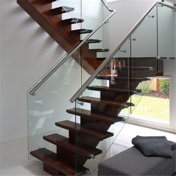 Brown staircase with Glass Railings