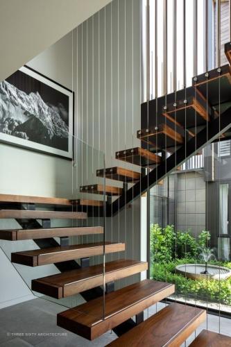 Indoor stairs with glass railings 